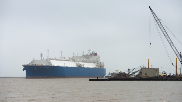 Photo shows a liquified natural gas tanker make its way into Cameron Pass, Louisiana, near a gas-exporting facility that is undergoing expansion, in April 2022.