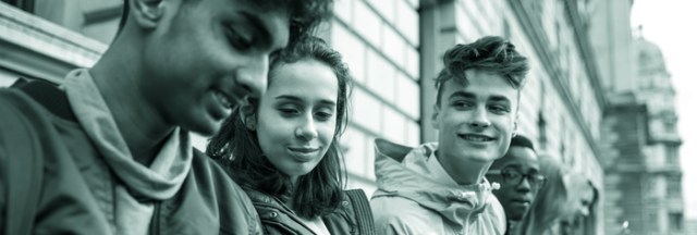 Teenagers students using smartphone on a school break