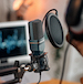 Young people recording podcast in studio