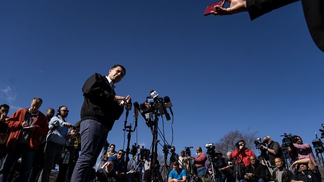 Then-Transportation Secretary Pete Buttigieg speaks to reporters in February 2023 at the site of the Norfolk Southern train derailment in East Palestine, Ohio. (Michael Swensen/Getty Images)