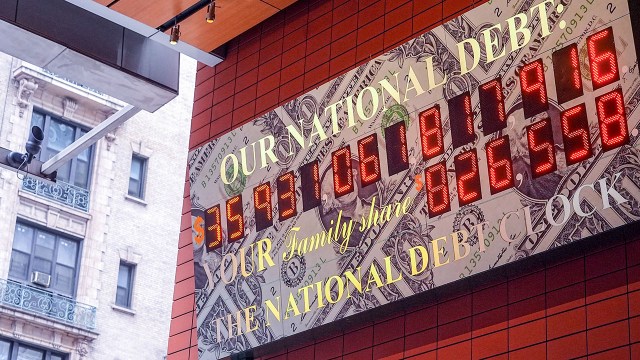 The National Debt Clock, a real-time tracker of the U.S. national debt and share per American family, on July 1, 2025, in New York City. (Selcuk Acar/Anadolu via Getty Images)