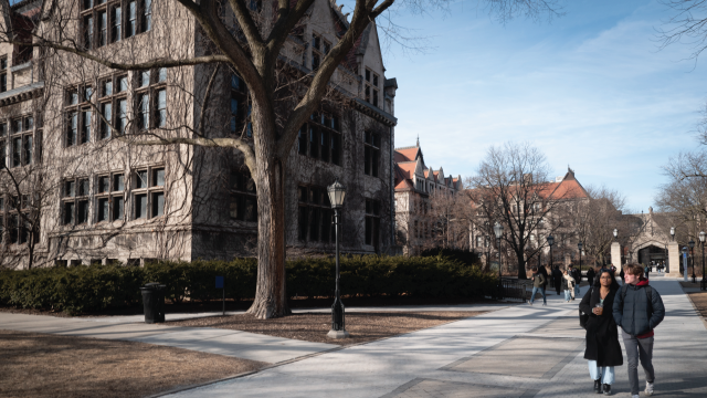 People walk on the University of Chicago campus in February. (Scott Olson/Getty Images)