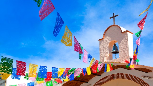 Colorful flags decorating church (Inti St Clair via Getty Images)