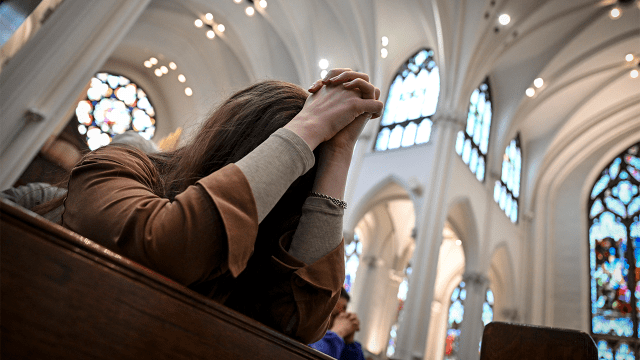 A parishioner prays during the Ash Wednesday service at the Cathedral Basilica of the Immaculate Conception in Denver on Feb. 18, 2026. (AAron Ontiveroz/The Denver Post via Getty Images)