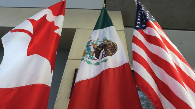 The Canadian, Mexican and U.S. flags are displayed in Ottawa in 2017. (Lars Hagberg/AFP via Getty Images)